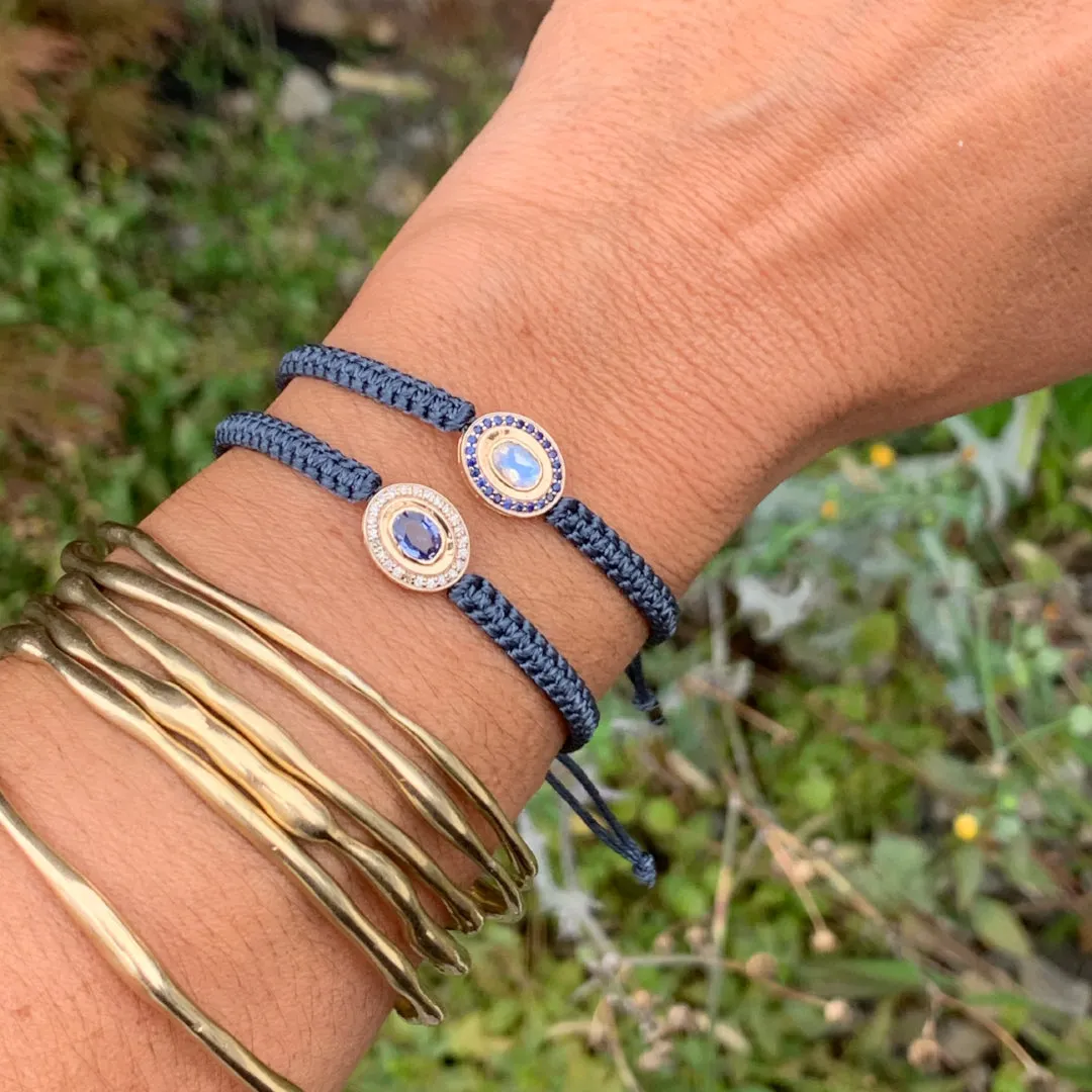 Moonstone and Sapphire braided bracelet in 10k yellow gold.