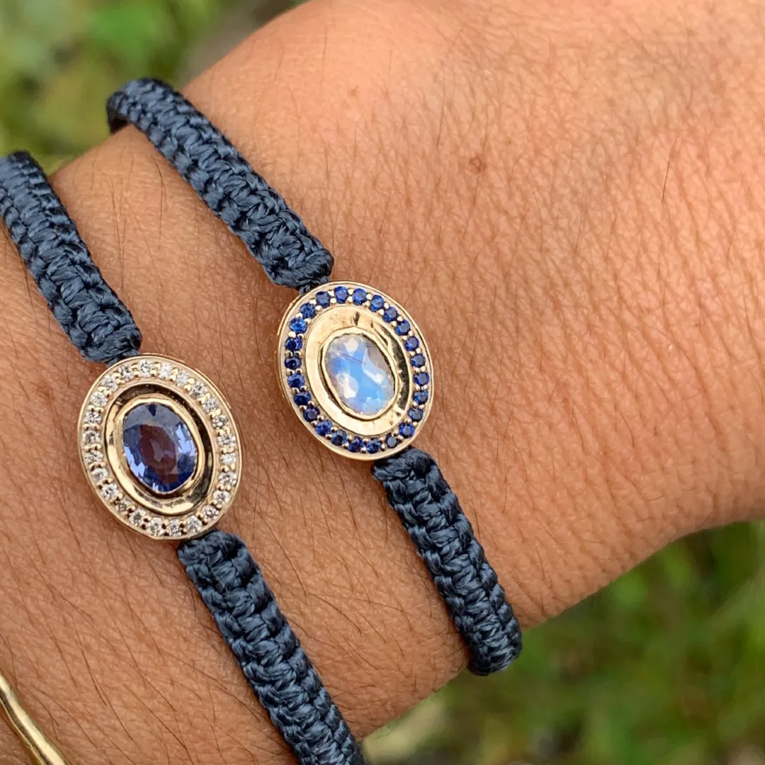 Moonstone and Sapphire braided bracelet in 10k yellow gold.
