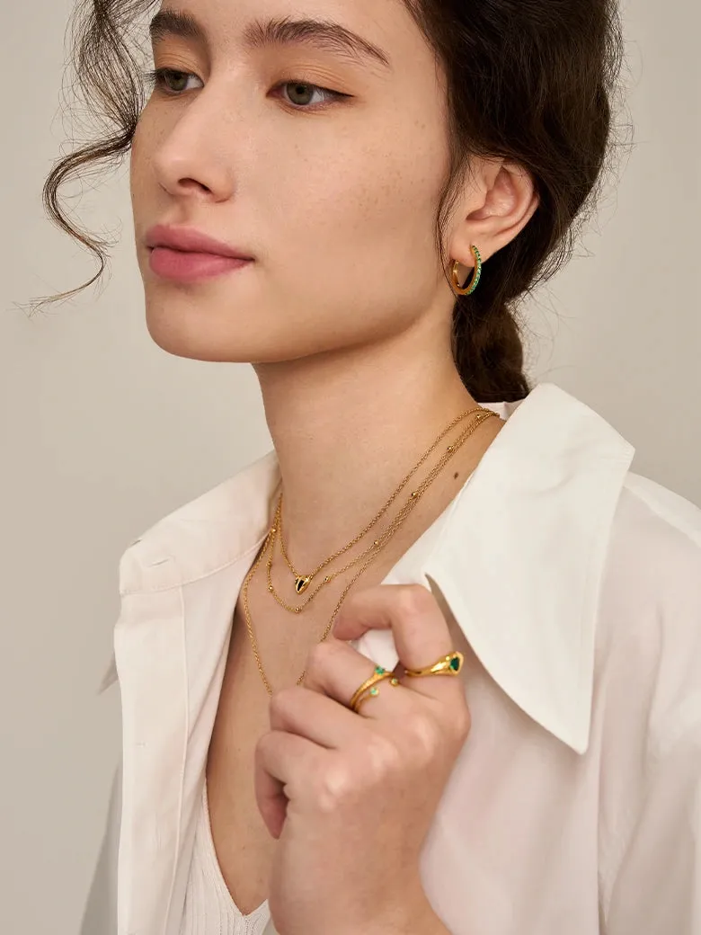OBY Emerald Pave Huggie Hoop Earrings