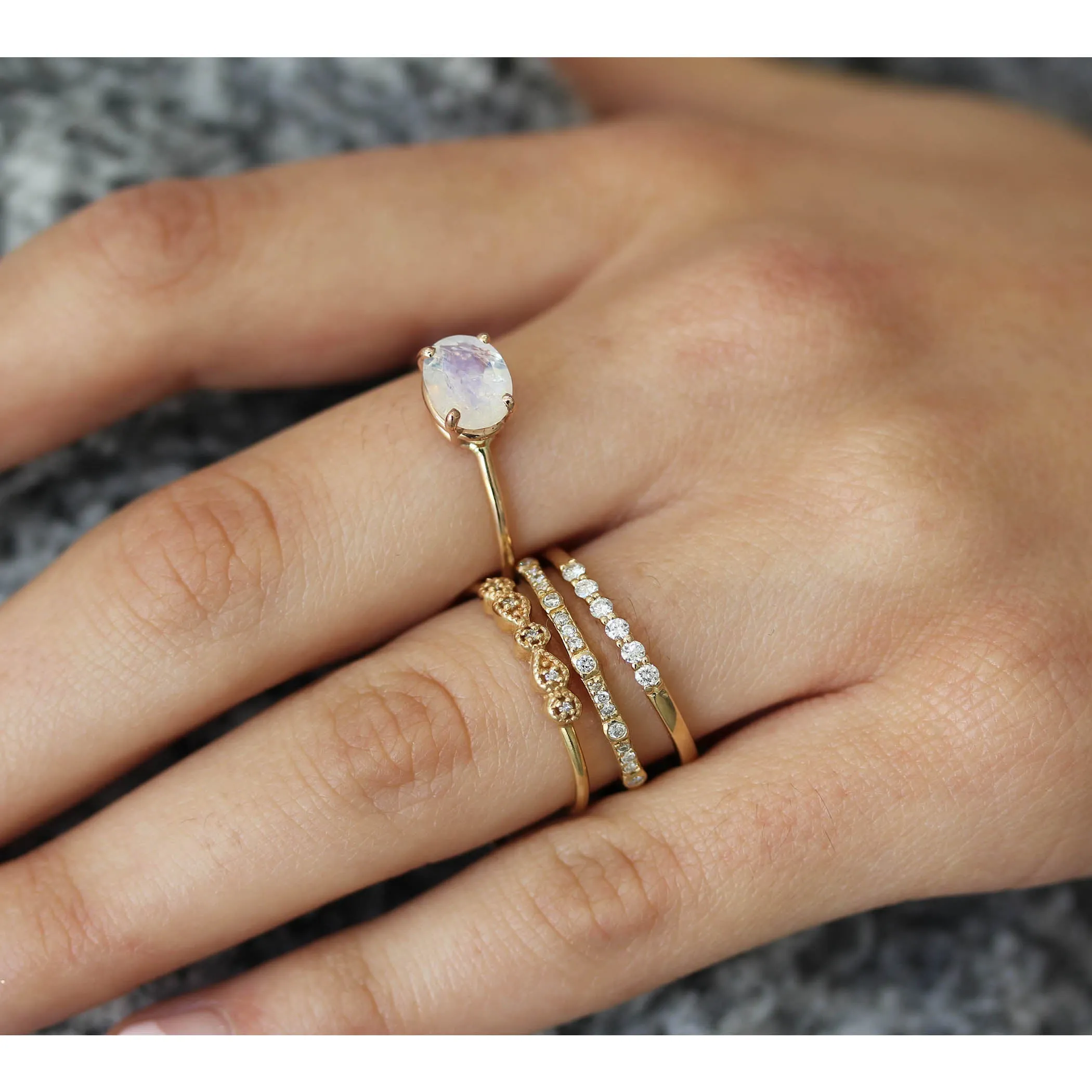 OVAL FACETED RAINBOW MOONSTONE RING