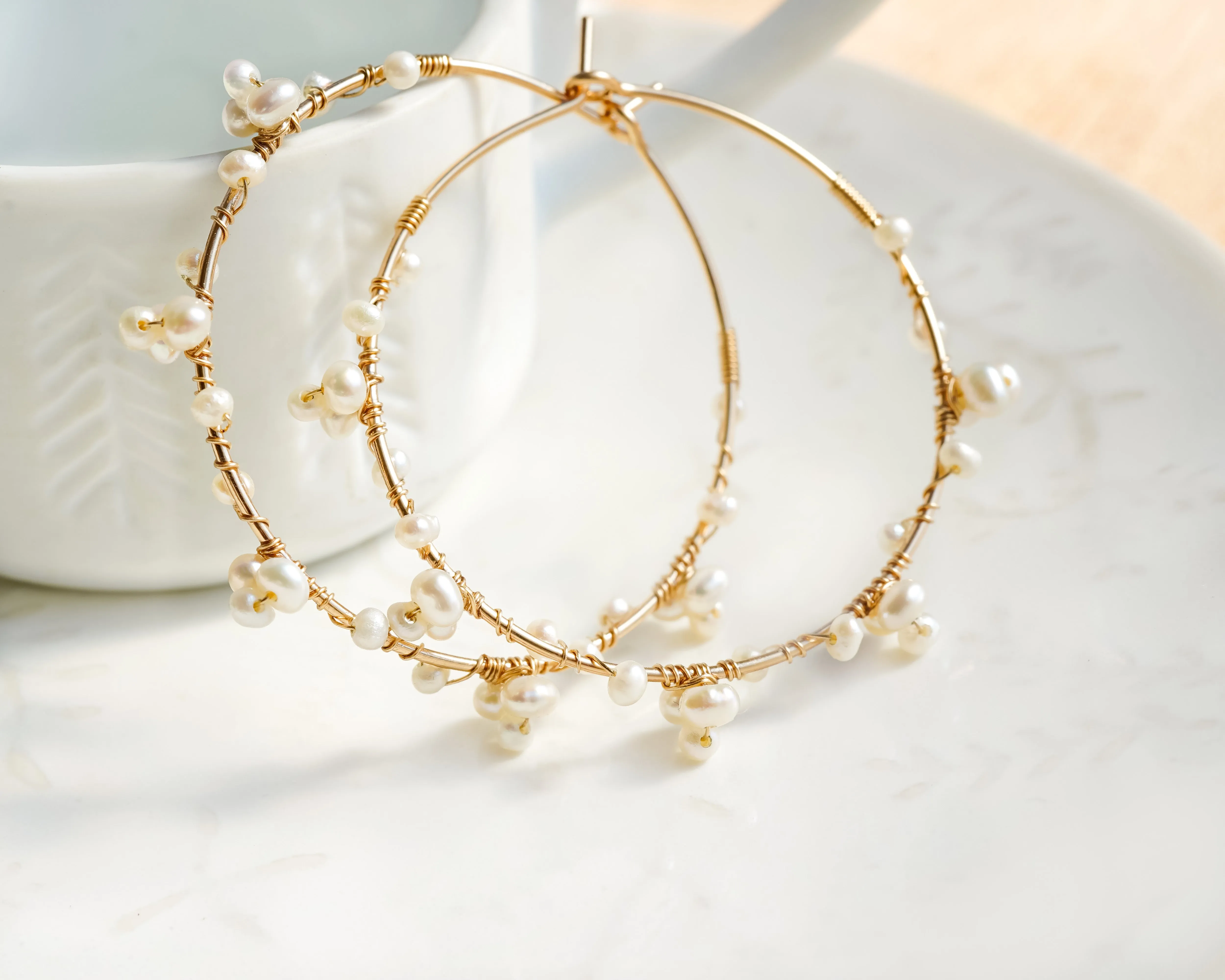 Tiny pearl wire wrapped gold hoop